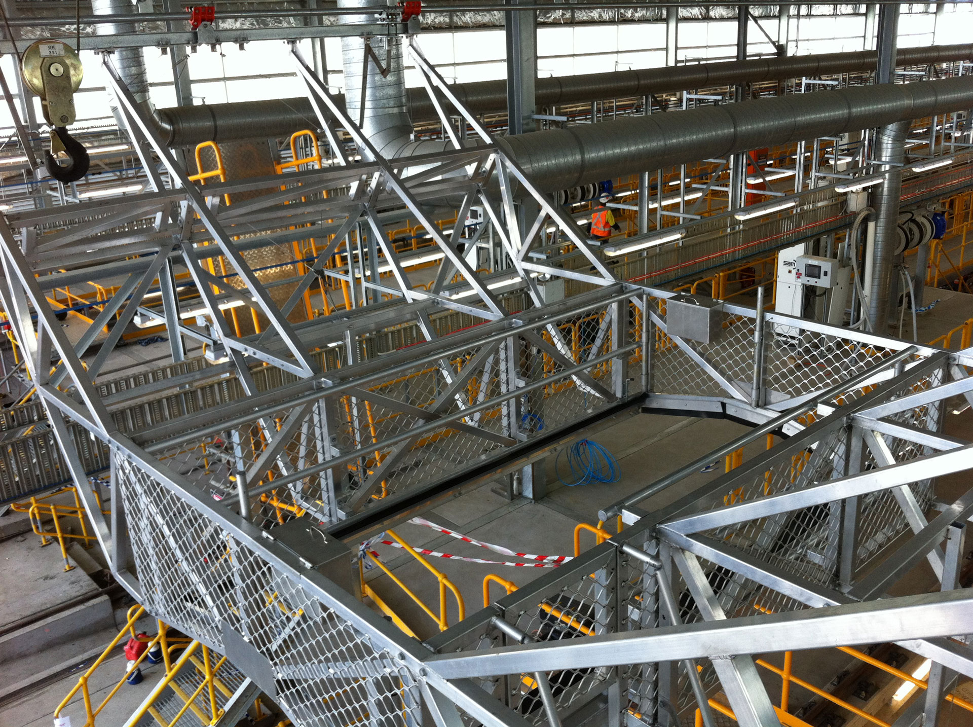 Engineers carrying out design, fabrication and installation work for an industrial engineering project